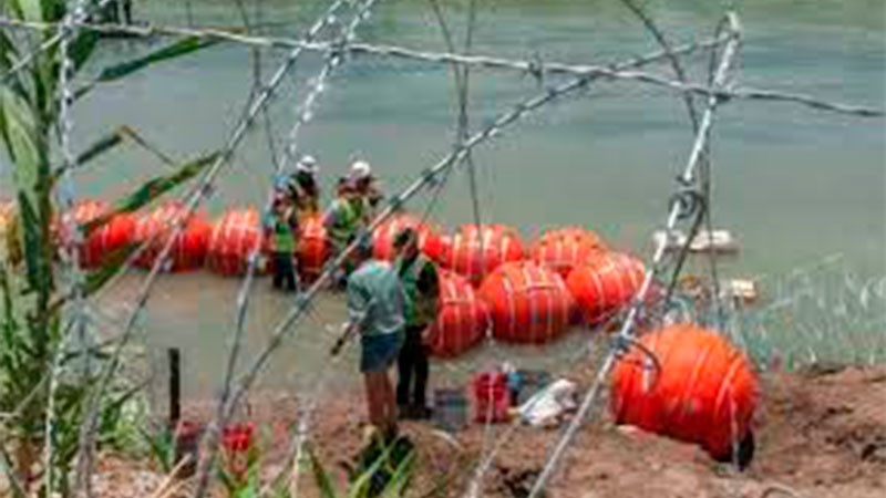 Departamento de Justicia demandará a gobernador de Texas, por colocación de muro de boyas